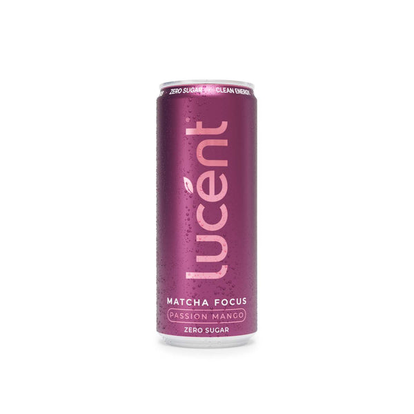 A single can of Lucent Matcha Focus Passion Mango zero sugar beverage, featuring a metallic magenta-pink can with condensation droplets, set against a plain white background.